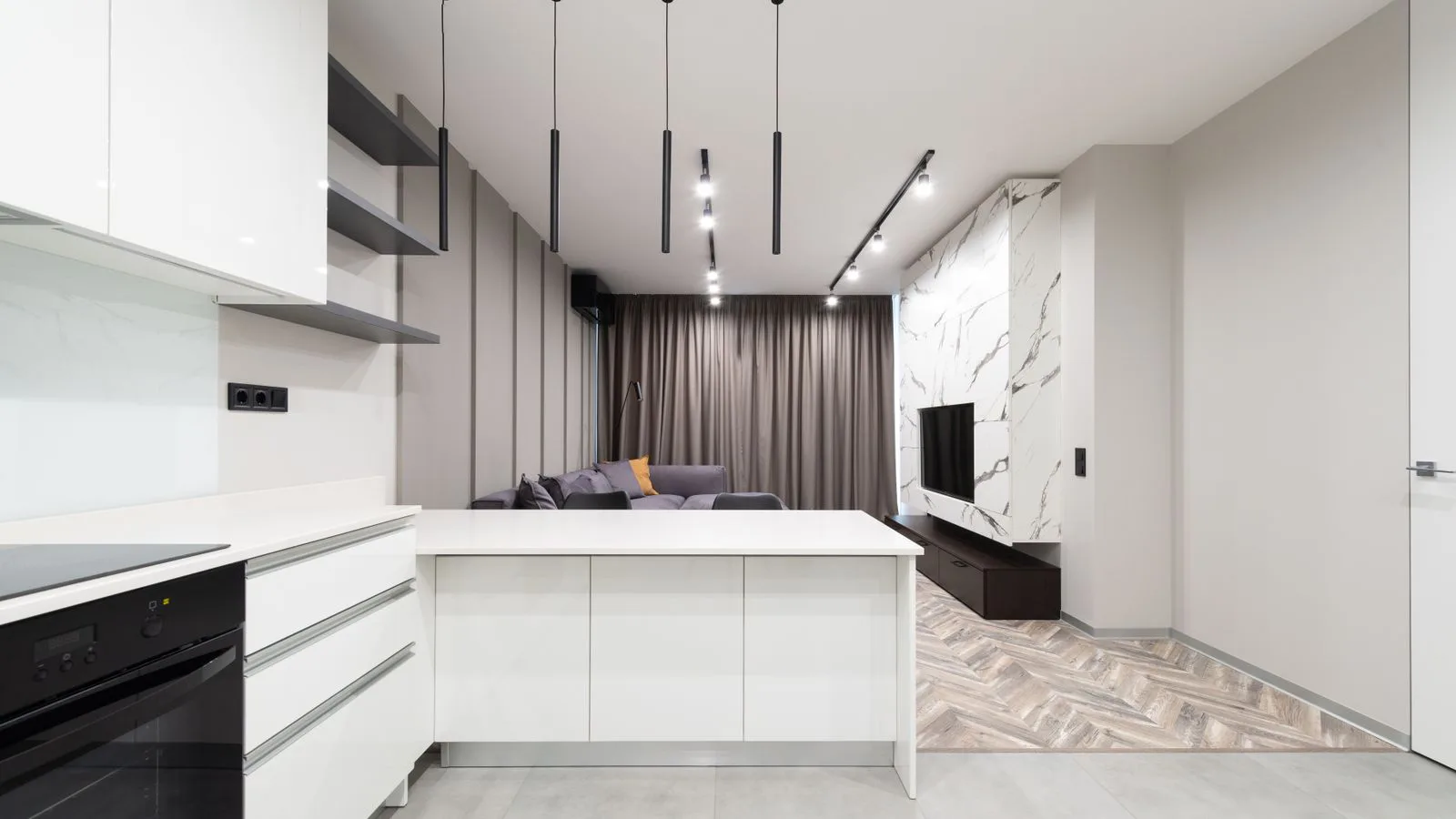 A bright studio flat with a fitted kitchen.
